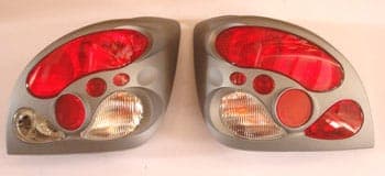 FORD FIESTA- 00/02; MODİFİYE STOP LAMBASI SAĞ/SOL SET 2 PARÇA GRİ/KIRMIZI/BEYAZ (TYC) (1/2)