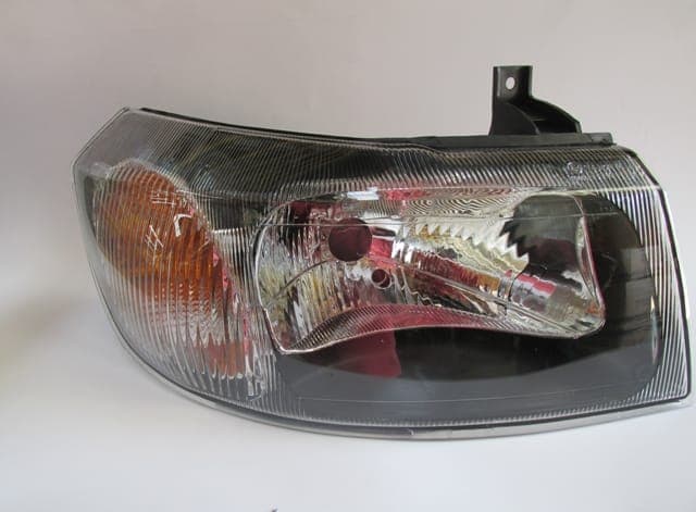 FORD TRANSIT- V184- 02/06; FAR LAMBASI SAĞ ELEKTRİKLİ/MANUEL SİYAH 4 FİŞLİ (H4)(AYFAR) (1/3)